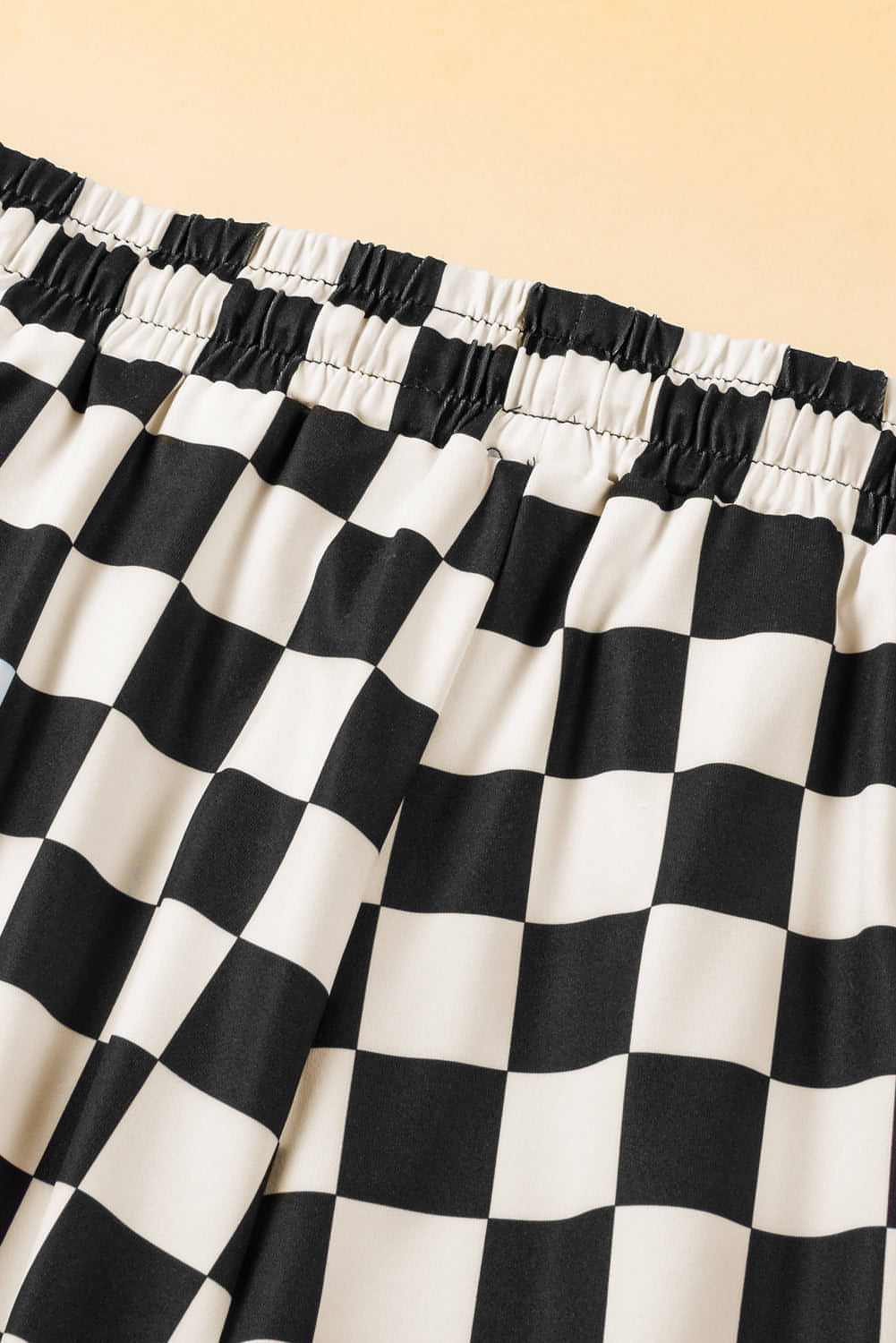 Schwarze karierte Kordelstring -Taille -Freizeit -Shorts