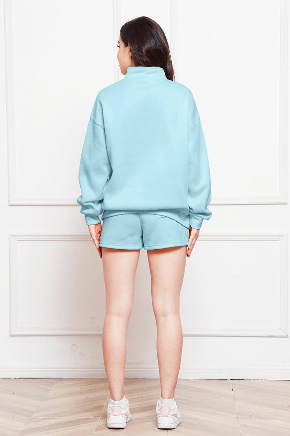 Set aus langärmligem Sweatshirt mit halbem Reißverschluss und Shorts mit Kordelzug