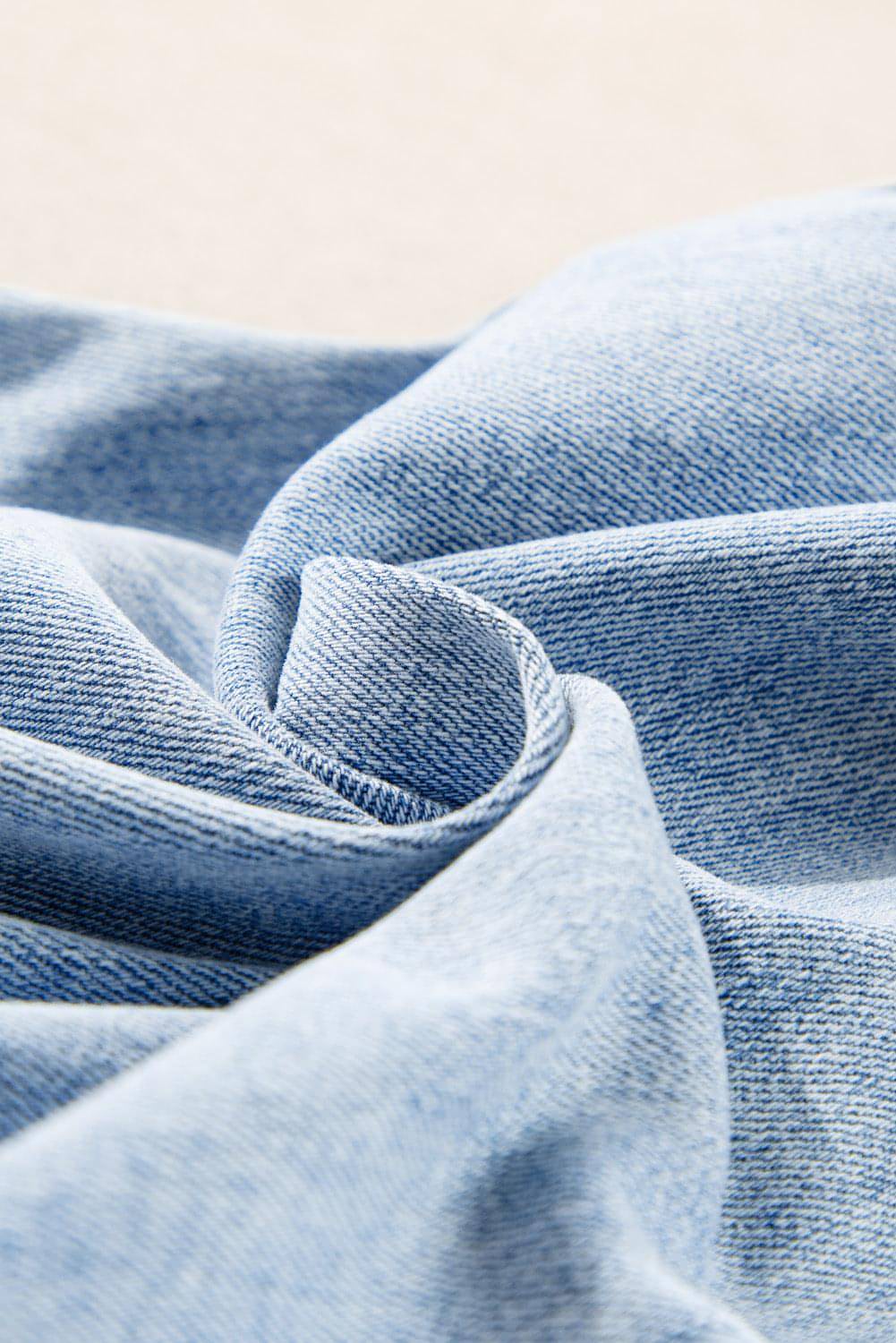 Beau Blue Light Wash nödställda flare jeans