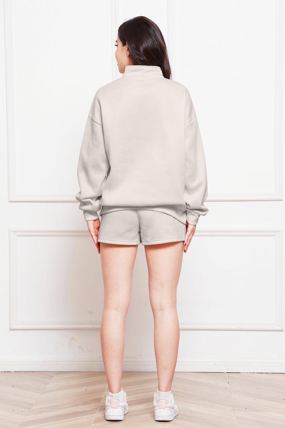 Set aus langärmligem Sweatshirt mit halbem Reißverschluss und Shorts mit Kordelzug