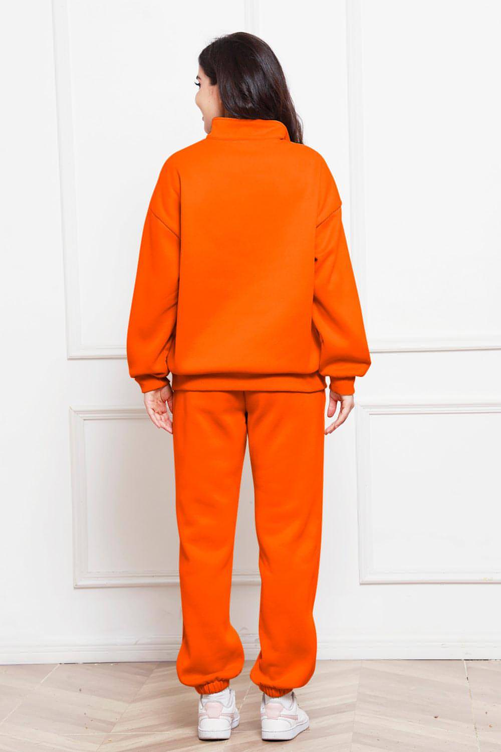 Completo di felpa e pantaloni a maniche lunghe con mezza zip