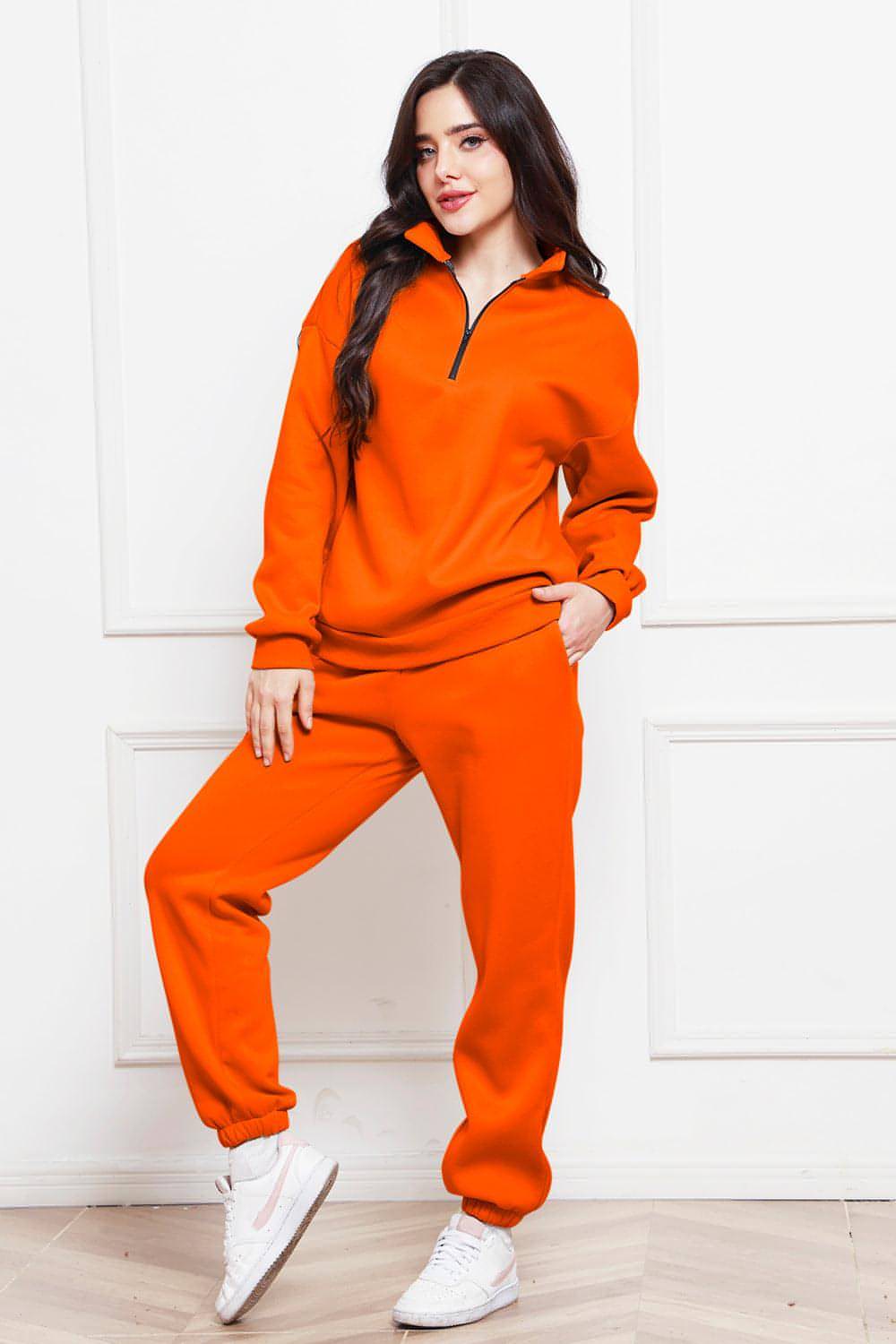 Completo di felpa e pantaloni a maniche lunghe con mezza zip