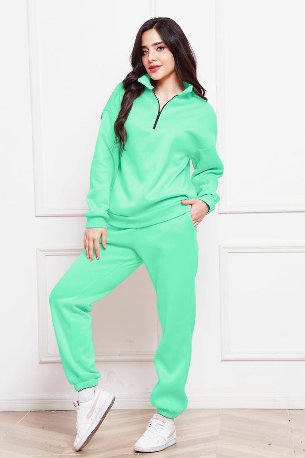 Completo di felpa e pantaloni a maniche lunghe con mezza zip