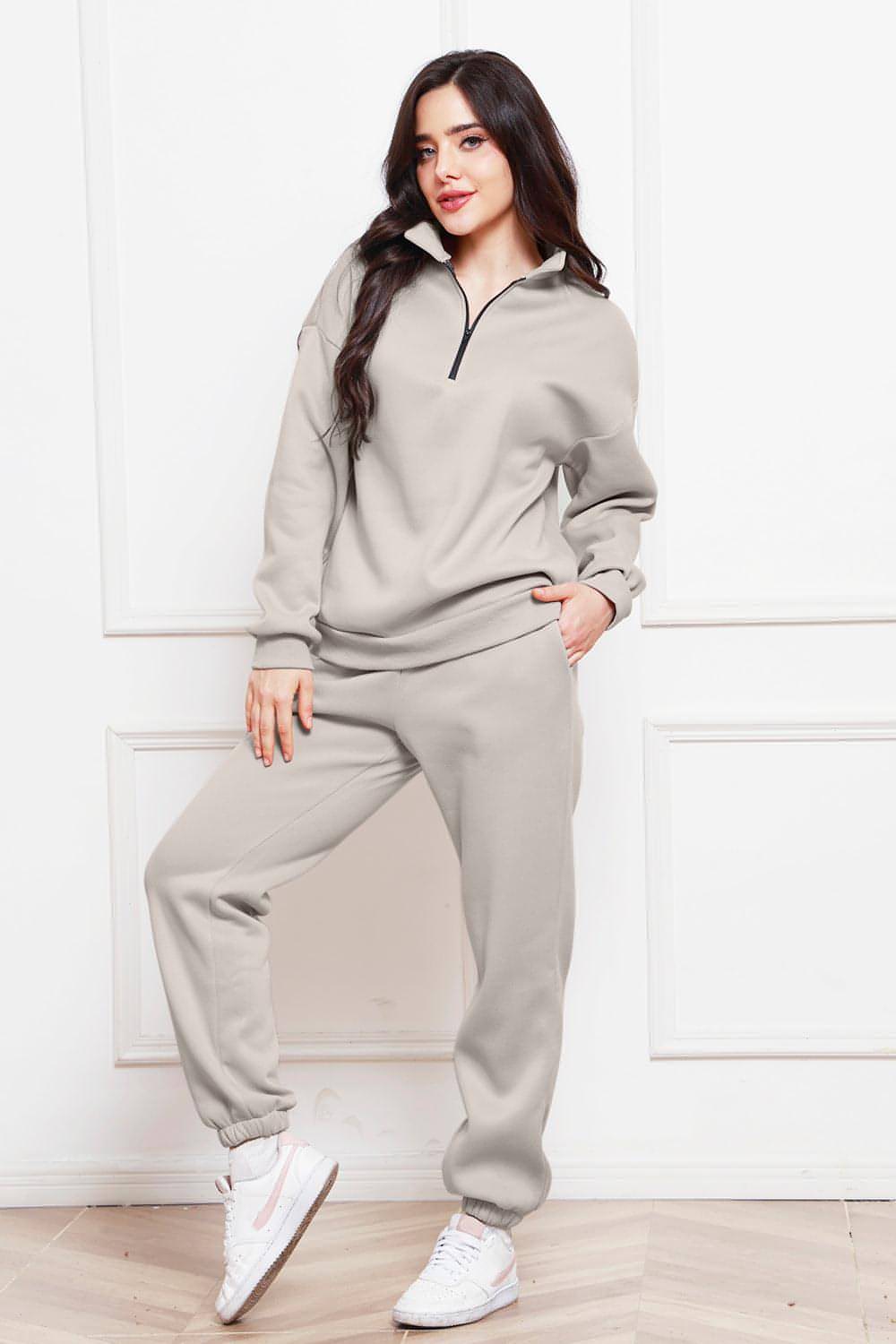 Completo di felpa e pantaloni a maniche lunghe con mezza zip