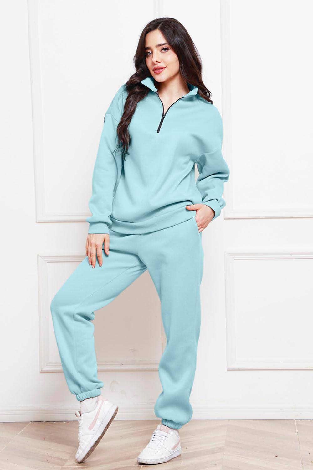 Completo di felpa e pantaloni a maniche lunghe con mezza zip