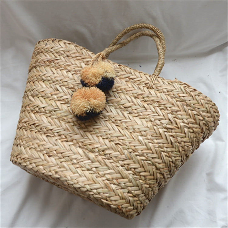 SolunaWeave™ – Raffia Pom Beach Bag