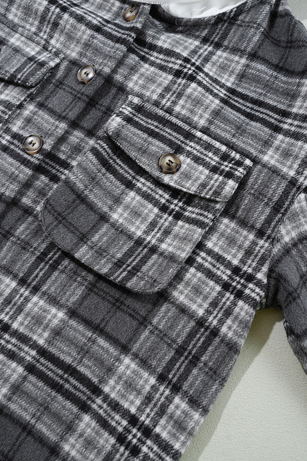 Black Plaid Print Flap Pockets Contrast Hooded Loose Shacket.