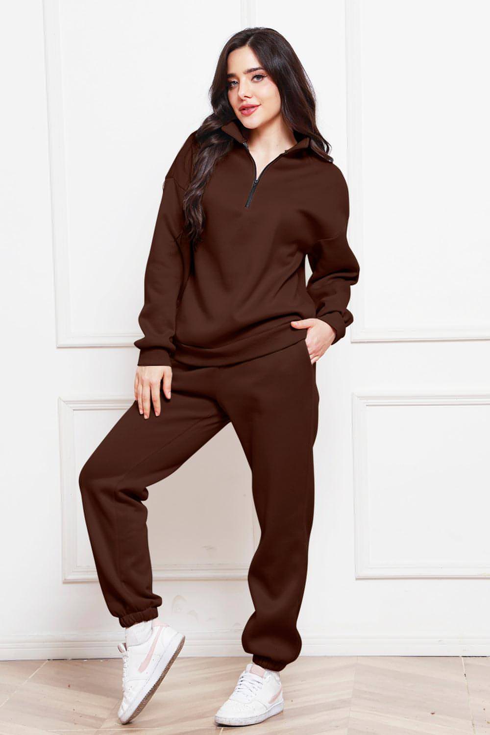 Completo di felpa e pantaloni a maniche lunghe con mezza zip