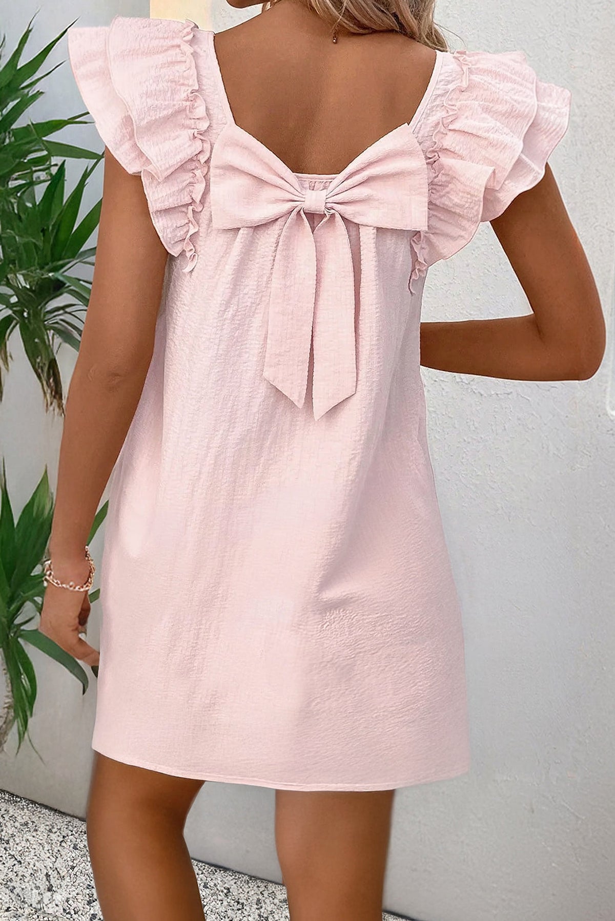 Light Pink Textured Flutter Sleeve Square Neck Bow Back Mini Dress - enhanced image 1