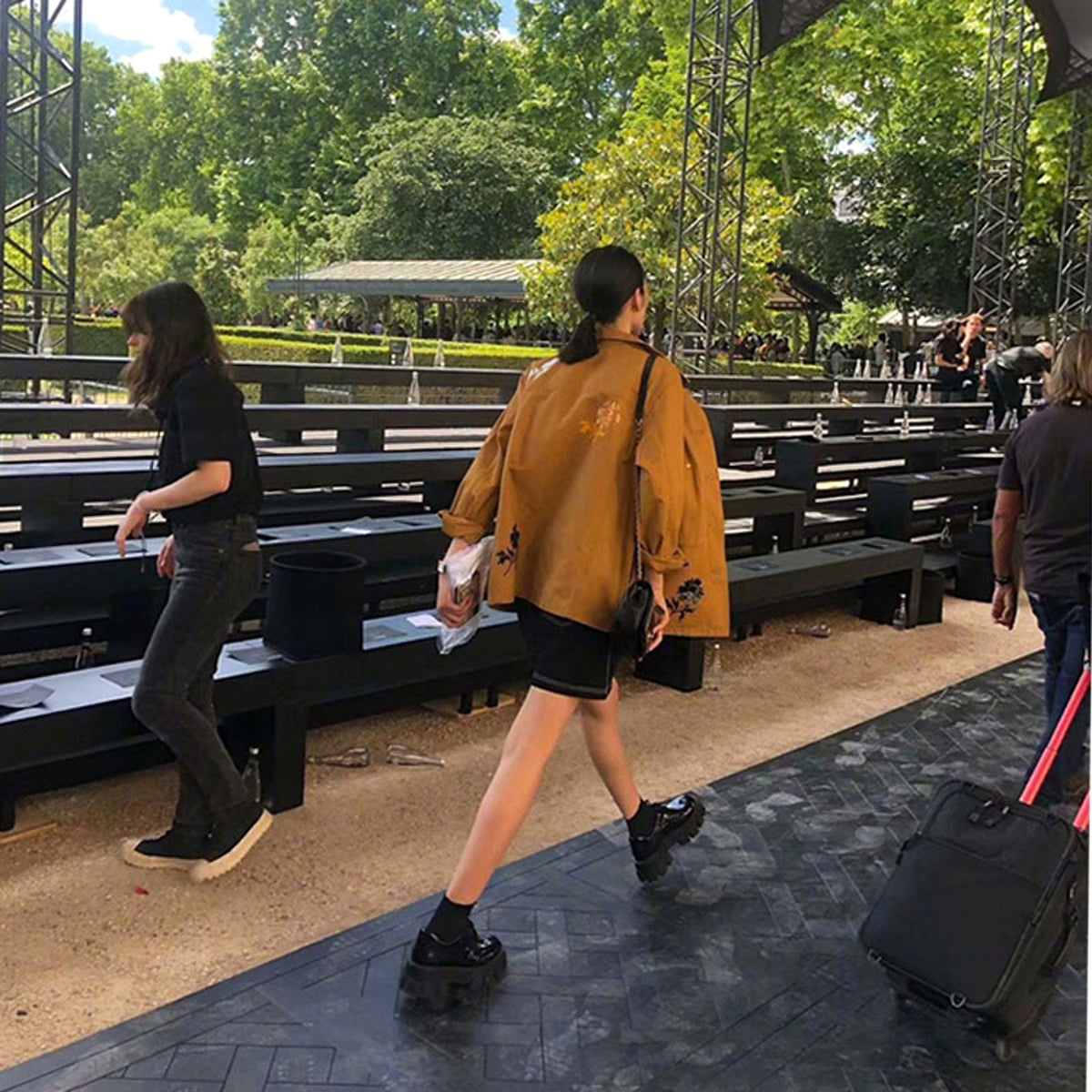 A Woman With A Platform And A Single Shoe - enhanced image 2