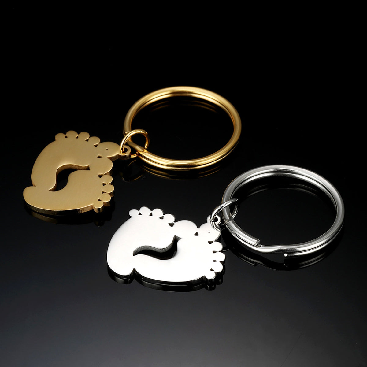 Two-Tone Stainless Steel Footprint Keychain – A Symbol of Love & Connection - enhanced image 5