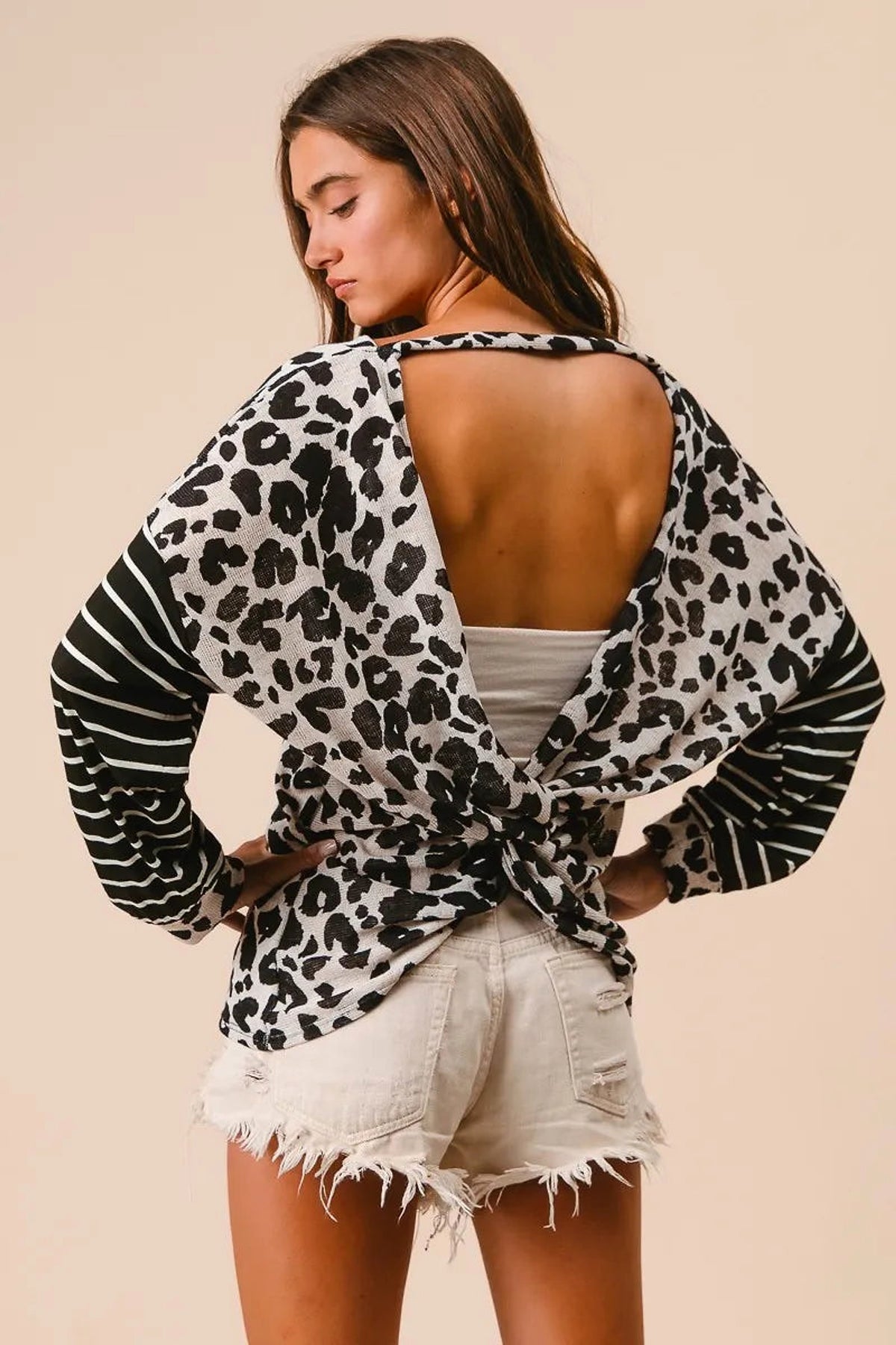 BiBi Leopard Hacci Knit Twist Back Top With Stripe Sleeve - enhanced image 9